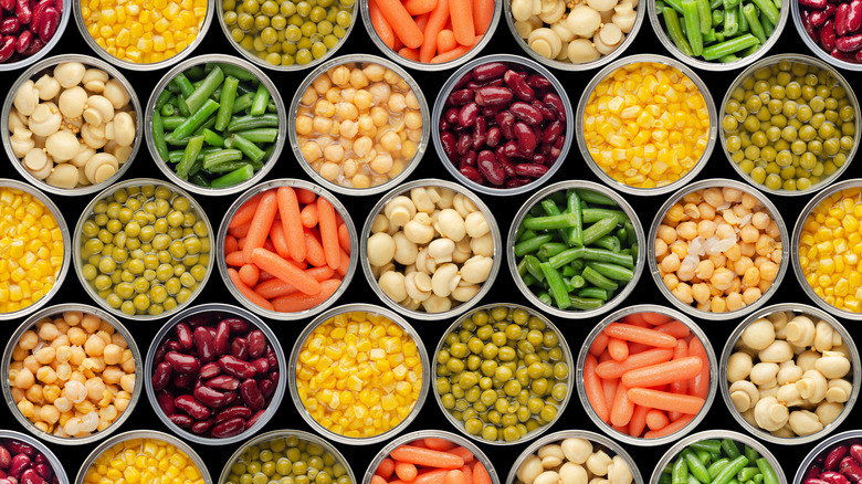 Collage of open cans of vegetables