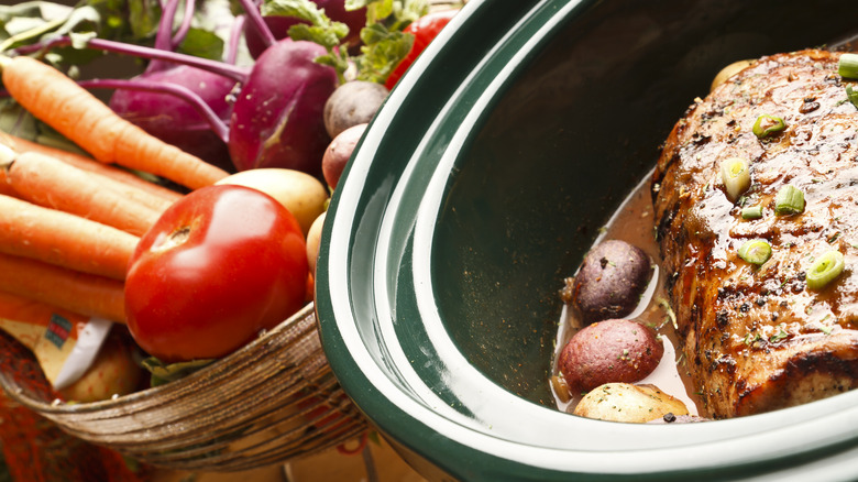 pot roast cooking in slow cooker